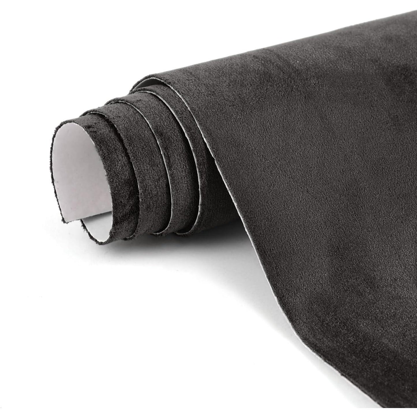 Adhesive suede interior wrap applied to door panels and armrests for a refined and comfortable touch