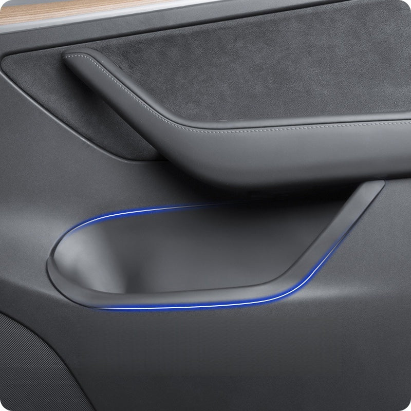 Anti-slip door storage insert maintains grip and shape during bumpy rides, perfectly matching the Model Y Juniper interior