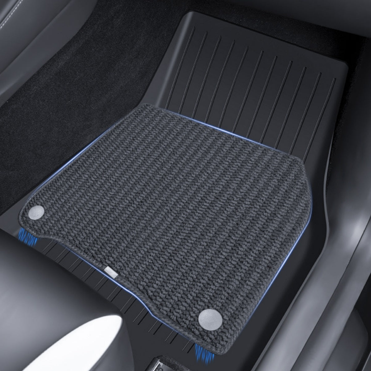 Full coverage TPE floor liners designed to protect all footwell areas of the Model Y Juniper interior