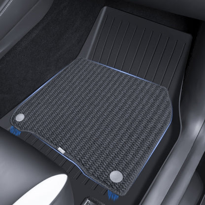 Full coverage TPE floor liners designed to protect all footwell areas of the Model Y Juniper interior