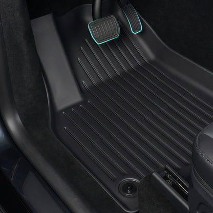 OEM style Tesla Model Y floor mats made from waterproof TPE material for clean factory interior look