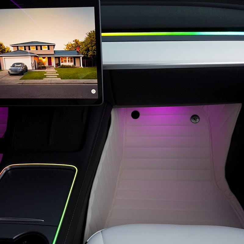 Seatback LED strip lights from the Tesla Model Y ambient lighting kit, adding stylish illumination behind the front seats